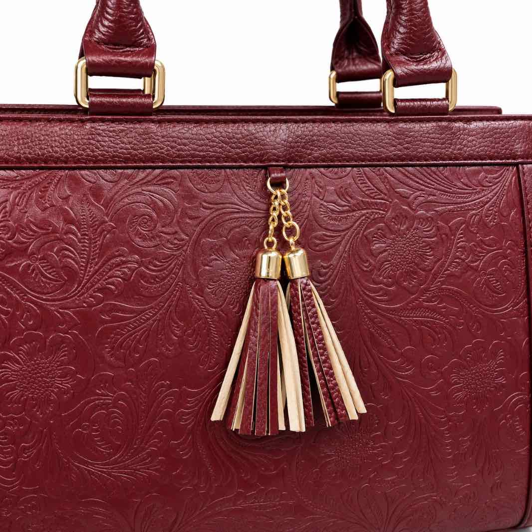 Luxury Textured Leather Handbag with Tassel & Gold Hardware